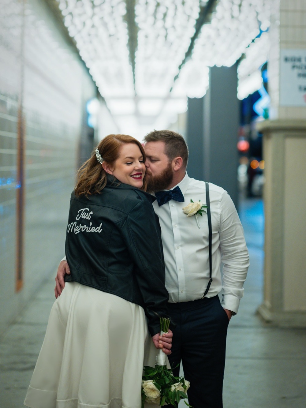 David's Bridal Black Leather Jacket with White 'Just Married' Script